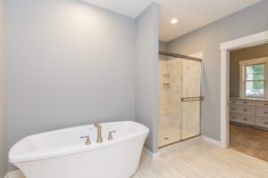 A Bathroom With a White Color Bathroom Tub