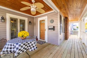 An Outdoor Plato Space With a Checker Blanket